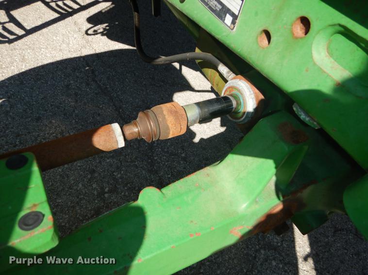 image for item DF1763 2001 John Deere 6310 MFWD tractor