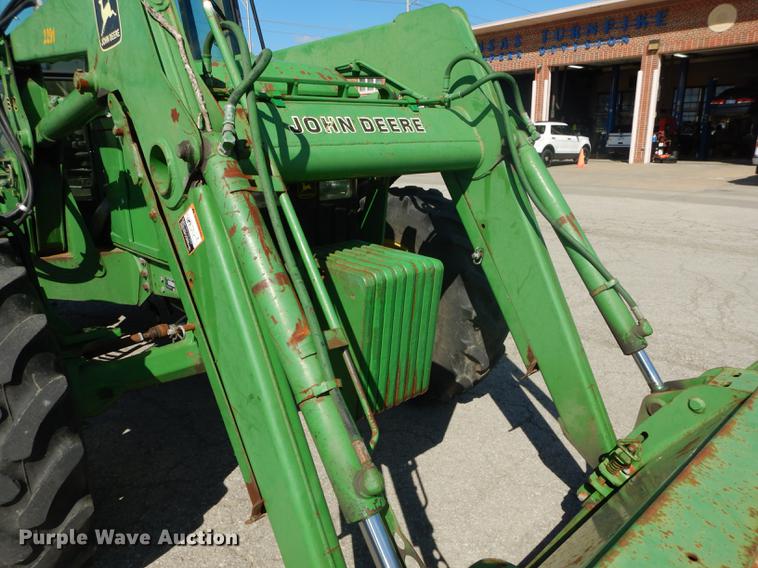 image for item DF1763 2001 John Deere 6310 MFWD tractor