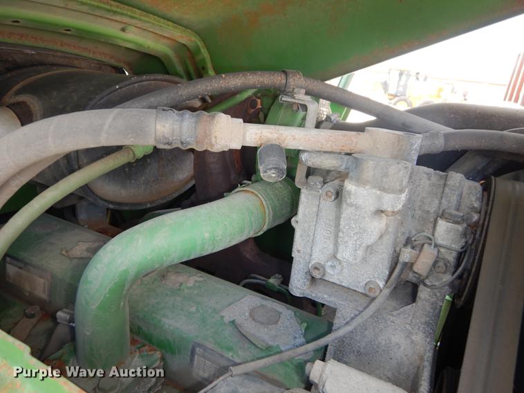 image for item DF1763 2001 John Deere 6310 MFWD tractor