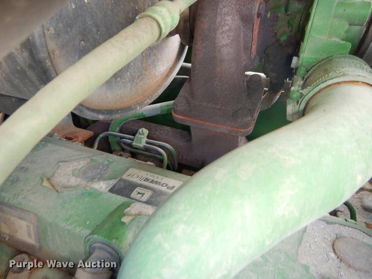 image for item DF1763 2001 John Deere 6310 MFWD tractor