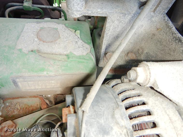 image for item DF1763 2001 John Deere 6310 MFWD tractor