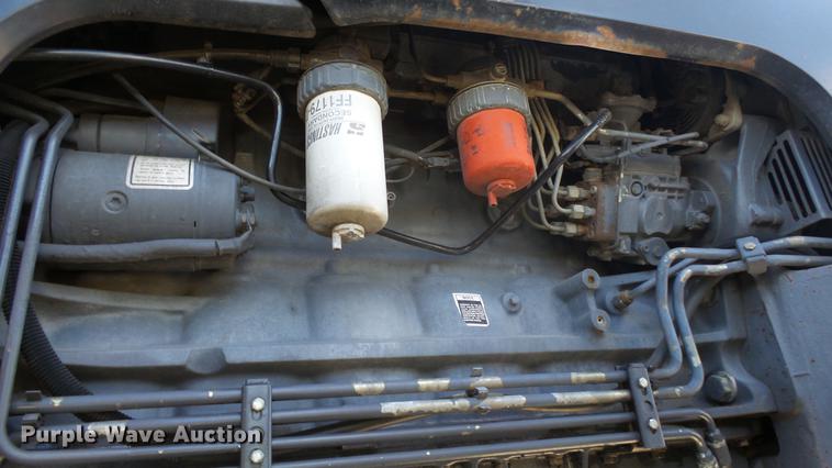 image for item DF4357 1998 New Holland 8260 MFWD tractor