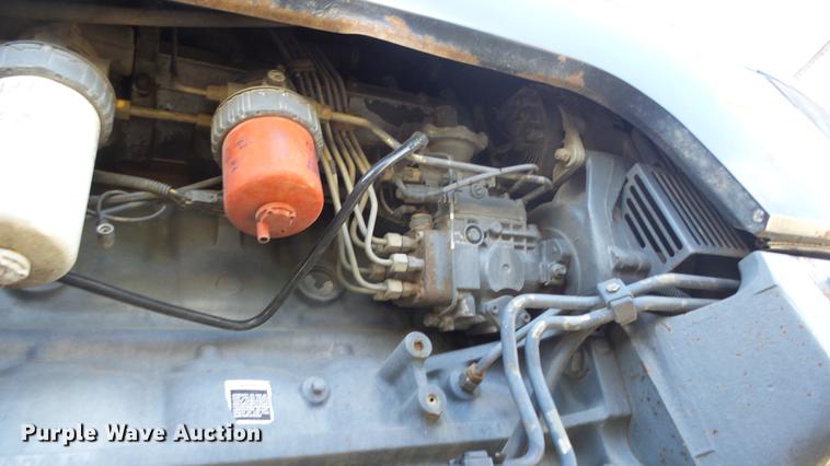 image for item DF4357 1998 New Holland 8260 MFWD tractor