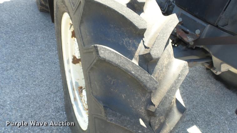 image for item DF4357 1998 New Holland 8260 MFWD tractor