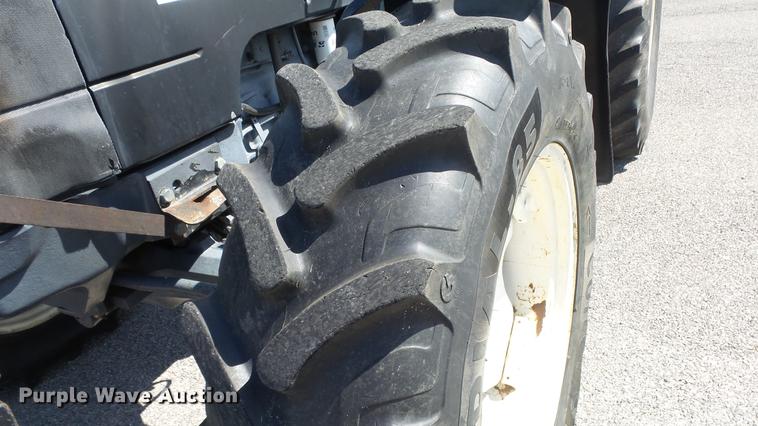 image for item DF4357 1998 New Holland 8260 MFWD tractor