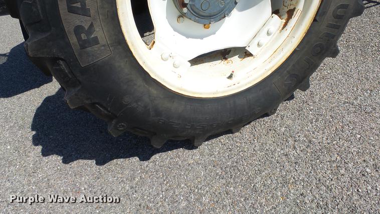 image for item DF4357 1998 New Holland 8260 MFWD tractor