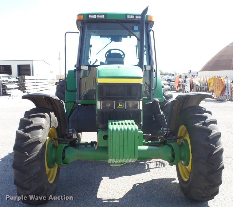 image for item DF4358 1999 John Deere 7210 MFWD tractor