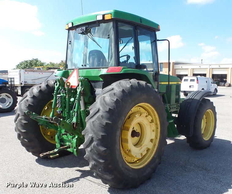 image for item DF4358 1999 John Deere 7210 MFWD tractor