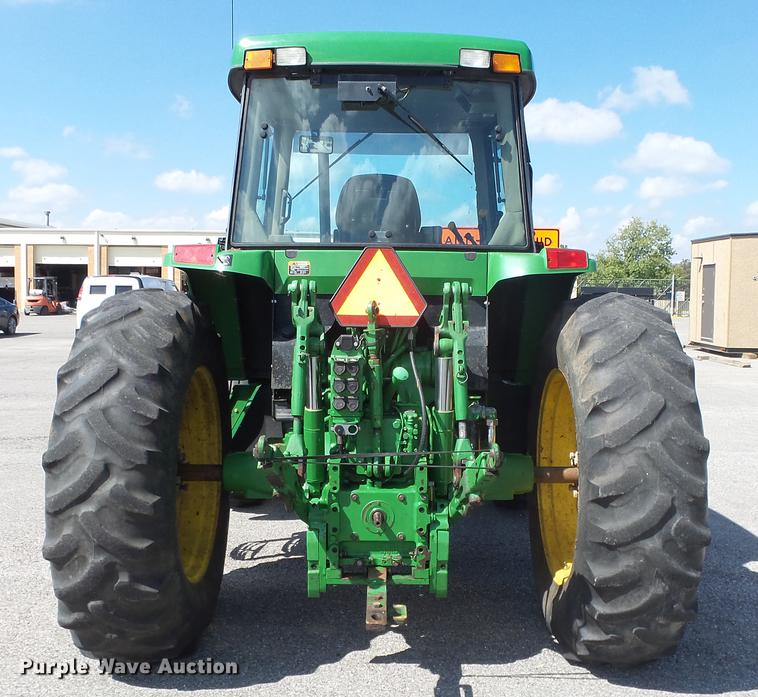 image for item DF4358 1999 John Deere 7210 MFWD tractor