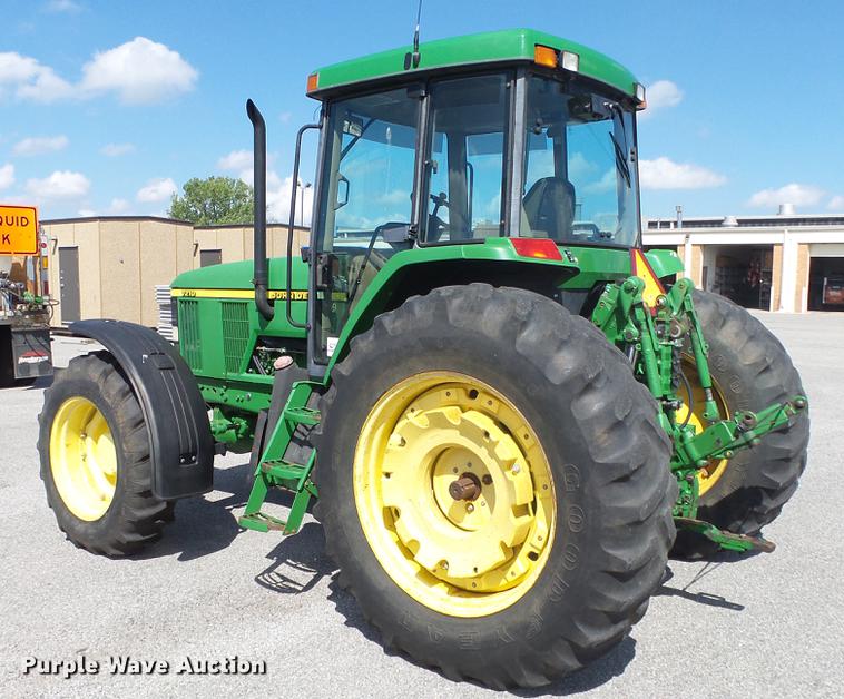 image for item DF4358 1999 John Deere 7210 MFWD tractor