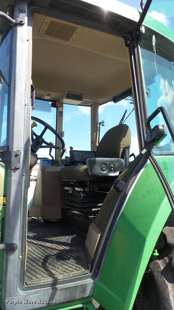 image for item DF4358 1999 John Deere 7210 MFWD tractor