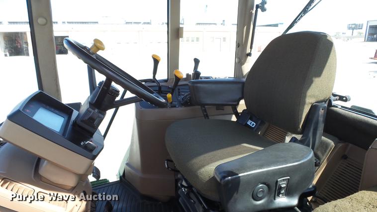 image for item DF4358 1999 John Deere 7210 MFWD tractor