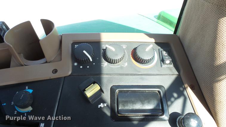 image for item DF4358 1999 John Deere 7210 MFWD tractor