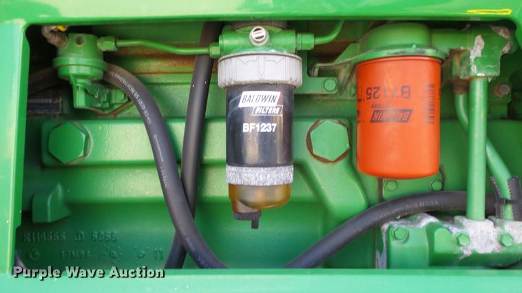 image for item DF4358 1999 John Deere 7210 MFWD tractor