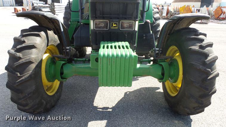 image for item DF4358 1999 John Deere 7210 MFWD tractor
