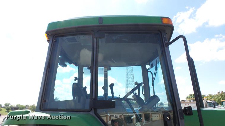 image for item DF4358 1999 John Deere 7210 MFWD tractor