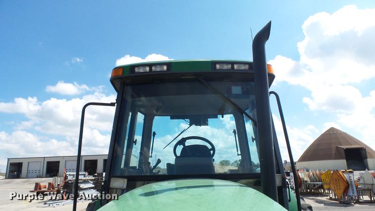 image for item DF4358 1999 John Deere 7210 MFWD tractor