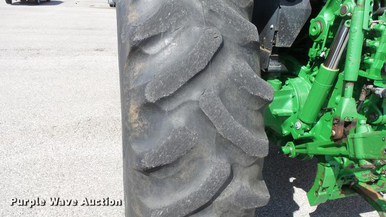 image for item DF4358 1999 John Deere 7210 MFWD tractor