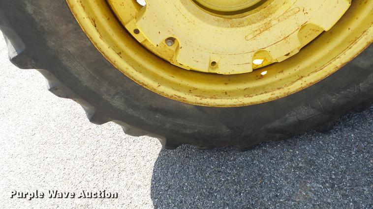 image for item DF4358 1999 John Deere 7210 MFWD tractor