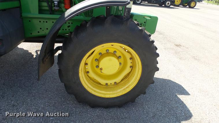 image for item DF4358 1999 John Deere 7210 MFWD tractor