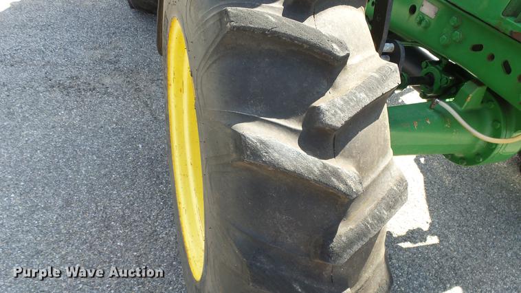 image for item DF4358 1999 John Deere 7210 MFWD tractor