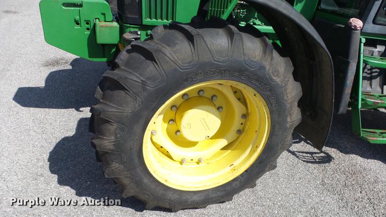 image for item DF4358 1999 John Deere 7210 MFWD tractor