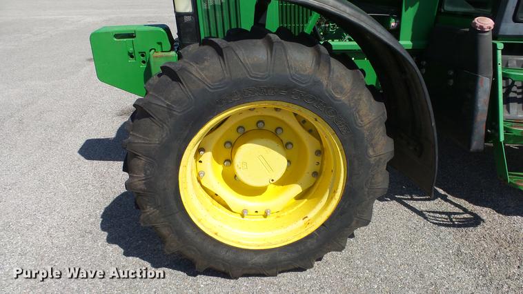 image for item DF4358 1999 John Deere 7210 MFWD tractor