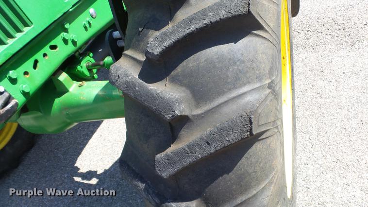 image for item DF4358 1999 John Deere 7210 MFWD tractor