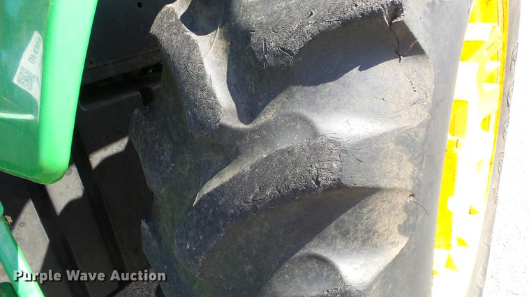 image for item DF4358 1999 John Deere 7210 MFWD tractor