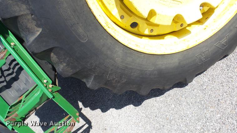 image for item DF4358 1999 John Deere 7210 MFWD tractor