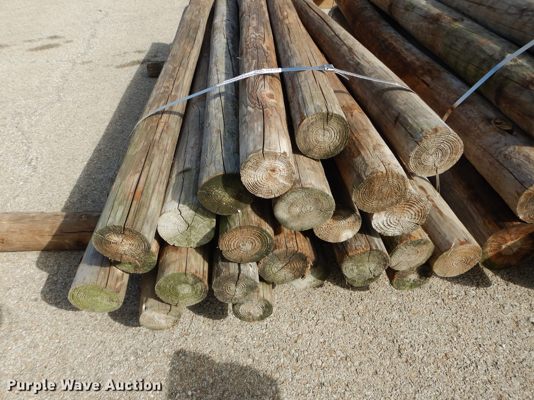 Approximately 23 wood posts in Topeka, KS | Item FC9334 sold | Purple Wave