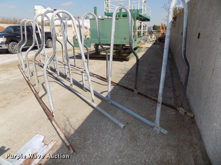 image for item G1324 Approximately 24 four and five cow aluminum stanchion sets