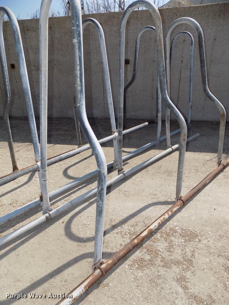 image for item G1324 Approximately 24 four and five cow aluminum stanchion sets