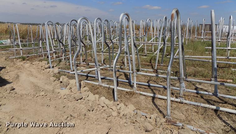 image for item G1324 Approximately 24 four and five cow aluminum stanchion sets