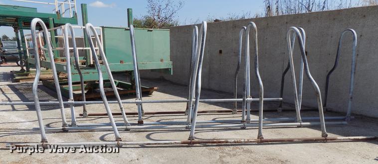 image for item G1326 Approximately 24 four and five cow aluminum stanchion sets