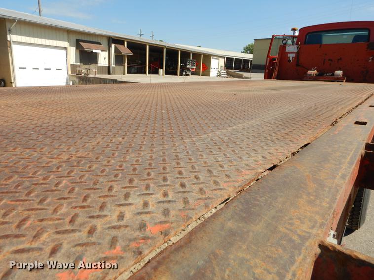 image for item DD6526 1995 Ford L8000 rollback truck