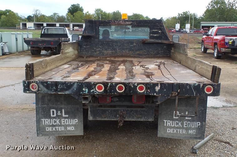 image for item DB7021 1986 Ford F350 dump flatbed pickup truck