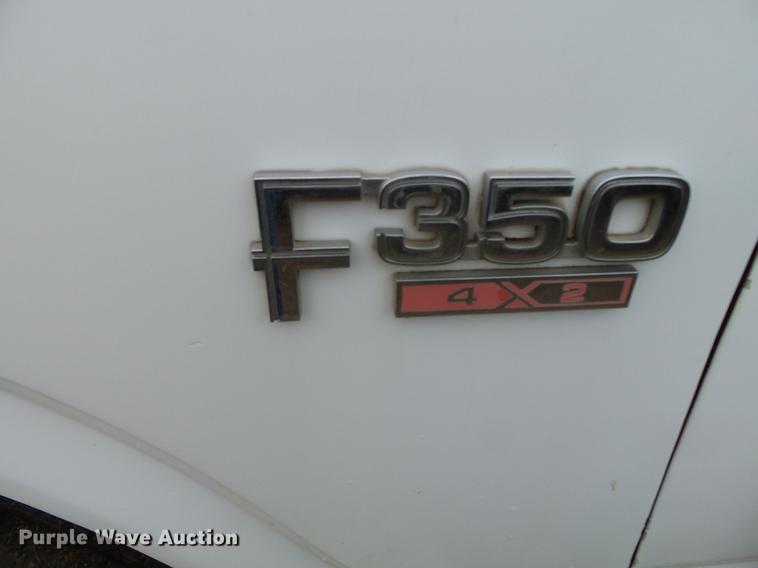 image for item DB7021 1986 Ford F350 dump flatbed pickup truck