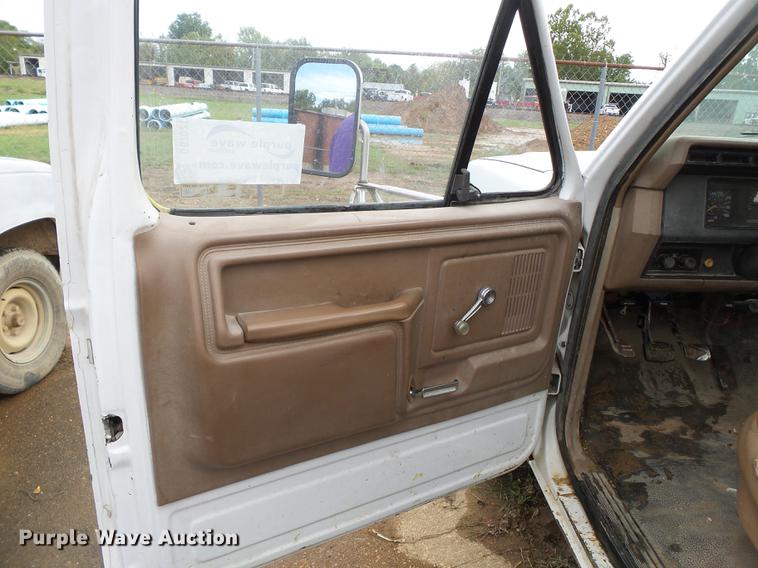 image for item DB7021 1986 Ford F350 dump flatbed pickup truck