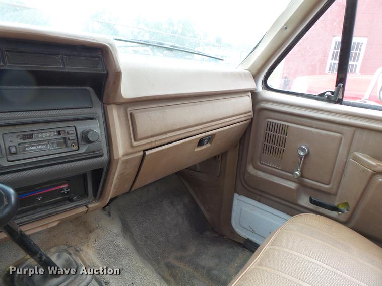 image for item DB7021 1986 Ford F350 dump flatbed pickup truck