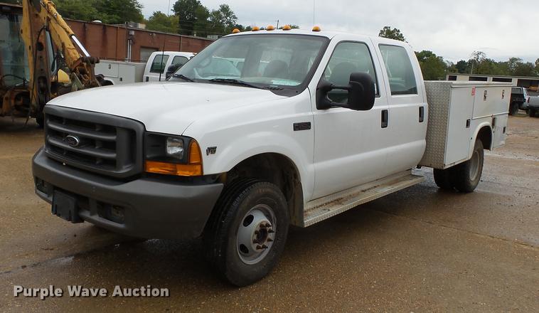 image for item DB7023 2001 Ford F350 Super Duty Crew Cab utility bed pickup truck