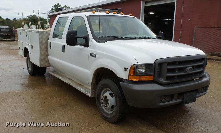 image for item DB7023 2001 Ford F350 Super Duty Crew Cab utility bed pickup truck