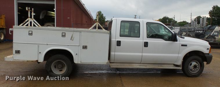 image for item DB7023 2001 Ford F350 Super Duty Crew Cab utility bed pickup truck