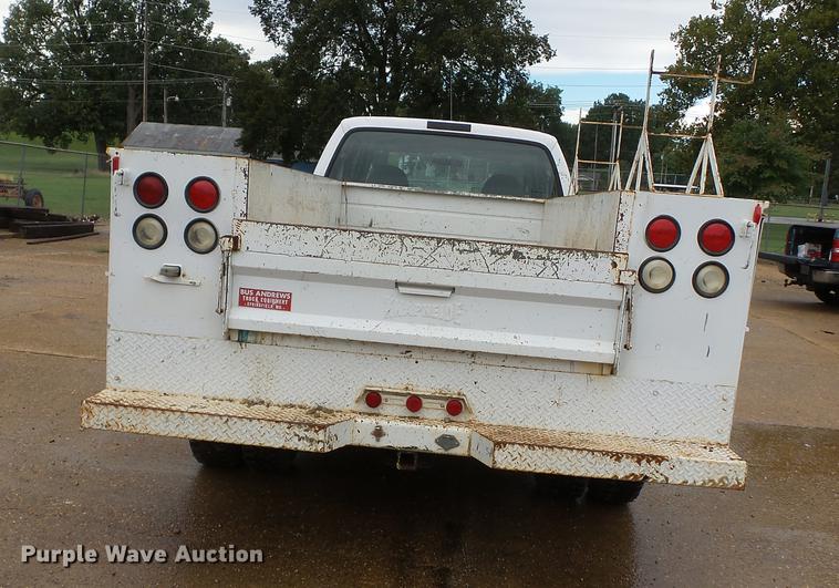 image for item DB7023 2001 Ford F350 Super Duty Crew Cab utility bed pickup truck