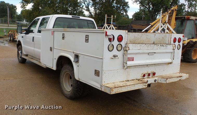 image for item DB7023 2001 Ford F350 Super Duty Crew Cab utility bed pickup truck