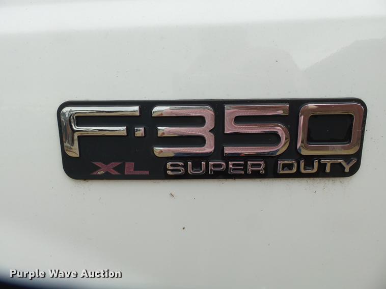 image for item DB7023 2001 Ford F350 Super Duty Crew Cab utility bed pickup truck