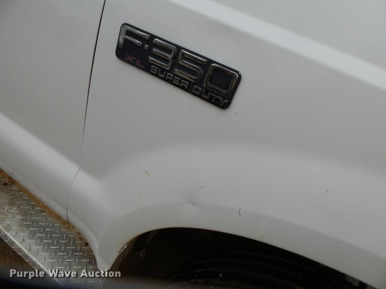 image for item DB7023 2001 Ford F350 Super Duty Crew Cab utility bed pickup truck