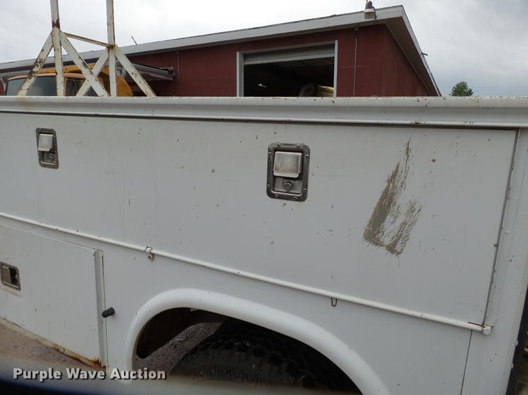 image for item DB7023 2001 Ford F350 Super Duty Crew Cab utility bed pickup truck