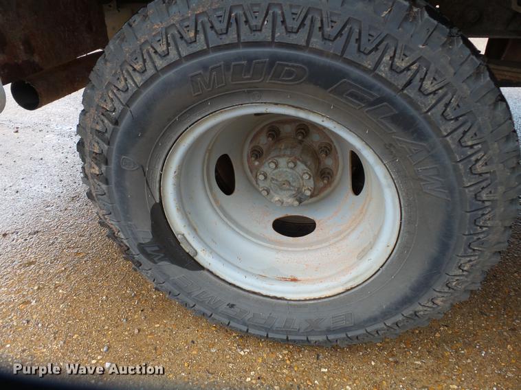 image for item DB7023 2001 Ford F350 Super Duty Crew Cab utility bed pickup truck