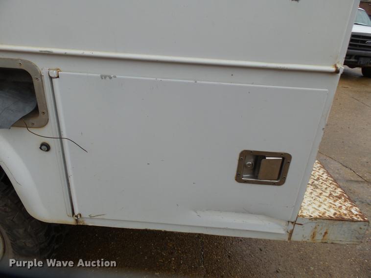 image for item DB7023 2001 Ford F350 Super Duty Crew Cab utility bed pickup truck